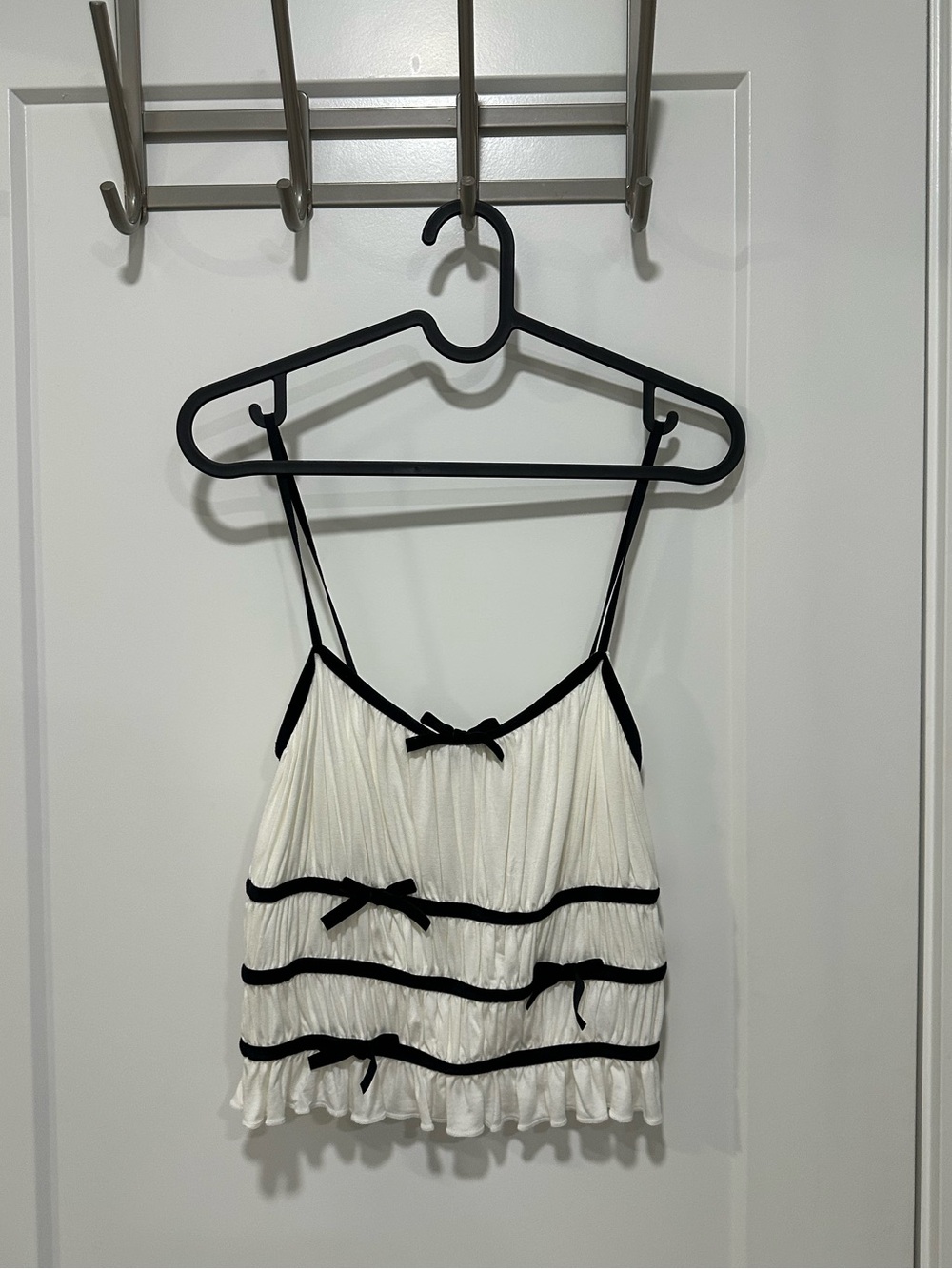 Urban Outfitters white tank top with velvet bows